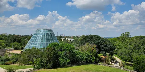 Gardens and glass conservatory in San Antonio Botanical Garden